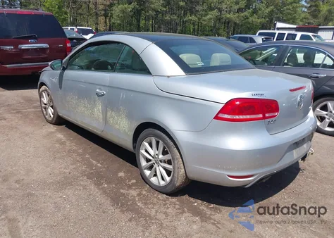2012 Volkswagen Eos Komfort из США, поврежденный, VIN WVWBW7AH8CV001621